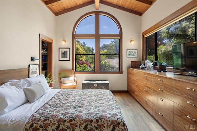 7 Linsdale Ln, Point Reyes Station, CA 94956 - bedroom with light wood-style floors, multiple windows, wooden ceiling with exposed beams, baseboards, and high vaulted ceiling