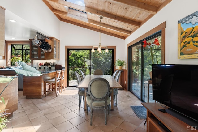 7 Linsdale Ln, Point Reyes Station, CA 94956 - dining room featuring wood ceiling with exposed beams, plenty of natural light, light tile patterned flooring, and high vaulted ceiling