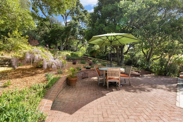 168 Vision Rd, Inverness, CA 94937 - view of patio featuring outdoor dining area and view of wooded area