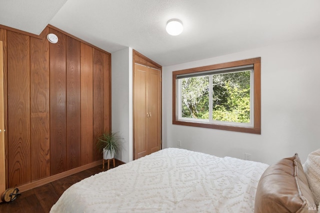 168 Vision Rd, Inverness, CA 94937 - bedroom featuring dark wood-type flooring, lofted ceiling, and baseboards