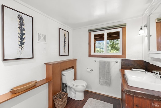 168 Vision Rd, Inverness, CA 94937 - bathroom featuring vanity, wood finished floors, toilet, and ornamental molding