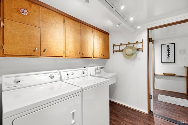 168 Vision Rd, Inverness, CA 94937 - laundry room with cabinet space, dark wood-type flooring, washing machine and clothes dryer, baseboards, and rail lighting