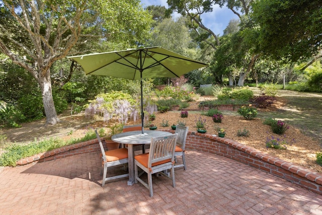 168 Vision Rd, Inverness, CA 94937 - view of patio / terrace featuring outdoor dining space and view of wooded area