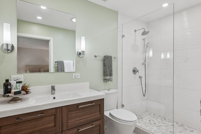 9 California Condor Way, Novato, CA 94949 - bathroom featuring vanity, toilet, a tile shower, and recessed lighting