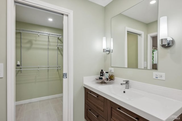 9 California Condor Way, Novato, CA 94949 - bathroom with vanity, a spacious closet, and recessed lighting