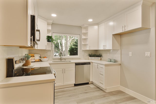 50 Montego Ct, Suisun City, CA 94585 - kitchen featuring open shelves, appliances with stainless steel finishes, tasteful backsplash, light wood finished floors, and white cabinets