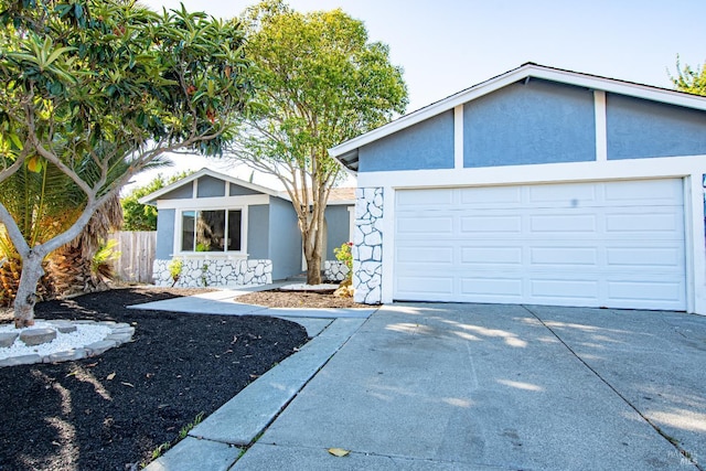 50 Montego Ct, Suisun City, CA 94585 - view of front facade featuring driveway, stucco siding, and a garage