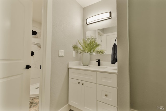 50 Montego Ct, Suisun City, CA 94585 - full bathroom featuring vanity, a stall shower, and a textured wall