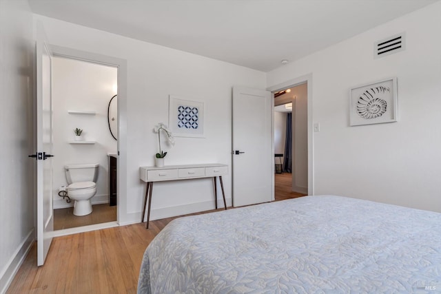 3641 Evergreen Ct, Napa, CA 94558 - bedroom featuring light wood-style floors, ensuite bathroom, and baseboards