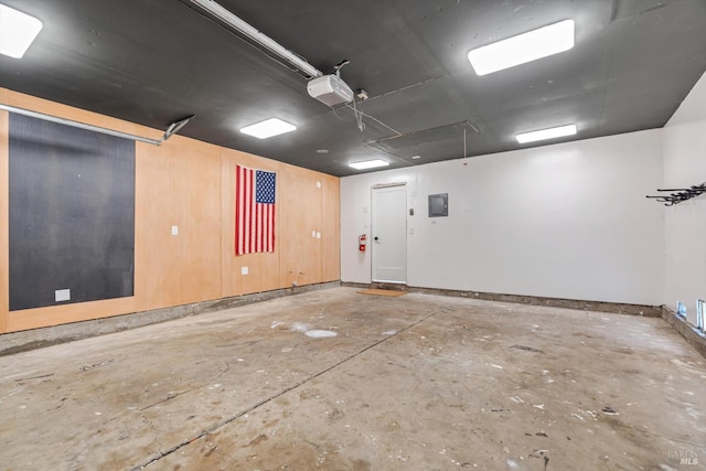 3641 Evergreen Ct, Napa, CA 94558 - garage featuring electric panel, a garage door opener, and baseboards