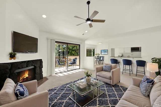 21100 Gary Dr Unit 215, Hayward, CA 94546 - carpeted living area featuring vaulted ceiling, a fireplace, ceiling fan, and recessed lighting