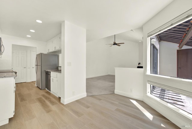 21100 Gary Dr Unit 215, Hayward, CA 94546 - kitchen with white cabinetry, recessed lighting, light wood finished floors, appliances with stainless steel finishes, and light countertops
