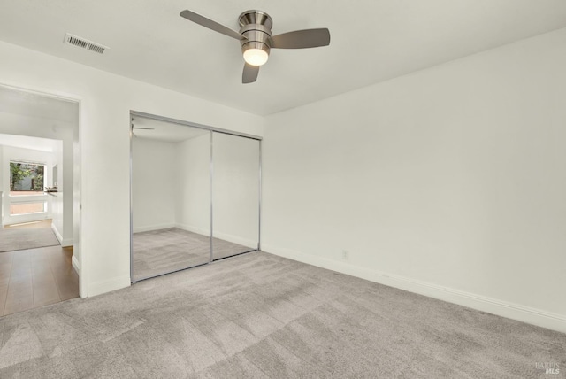 21100 Gary Dr Unit 215, Hayward, CA 94546 - unfurnished bedroom with carpet, baseboards, a closet, and ceiling fan