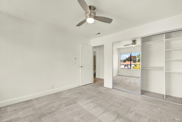 21100 Gary Dr Unit 215, Hayward, CA 94546 - unfurnished bedroom featuring carpet, baseboards, a ceiling fan, and a closet