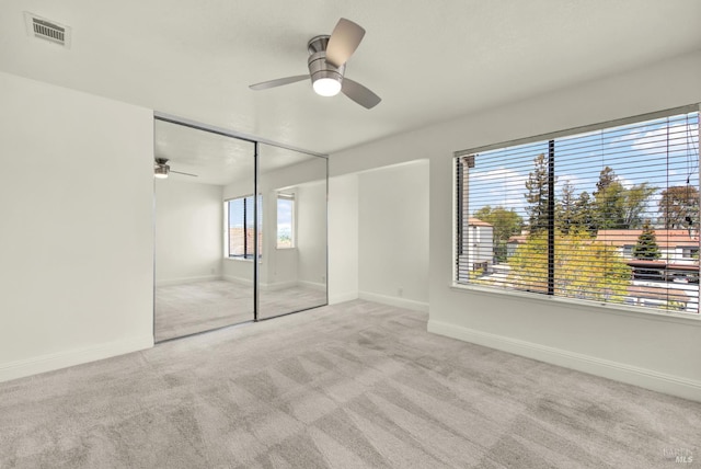 21100 Gary Dr Unit 215, Hayward, CA 94546 - unfurnished bedroom featuring carpet floors, baseboards, ceiling fan, and a closet