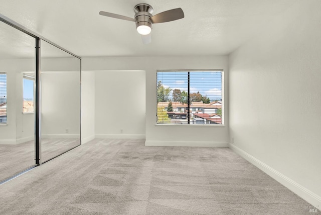 21100 Gary Dr Unit 215, Hayward, CA 94546 - carpeted empty room with ceiling fan and baseboards