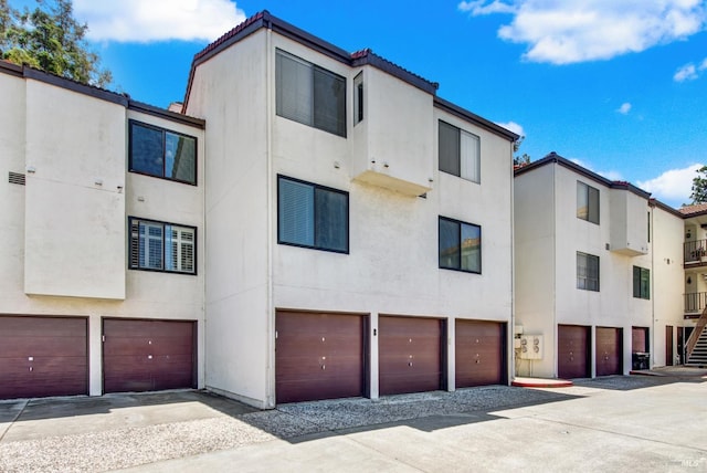 21100 Gary Dr Unit 215, Hayward, CA 94546 - view of building exterior featuring a garage