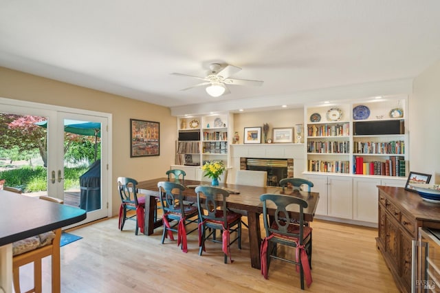 291 Maple Ave, Kenwood, CA 95452 - dining area featuring a fireplace, light wood-style floors, ceiling fan, beverage cooler, and french doors