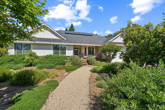 291 Maple Ave, Kenwood, CA 95452 - ranch-style home with a porch, roof mounted solar panels, and a shingled roof