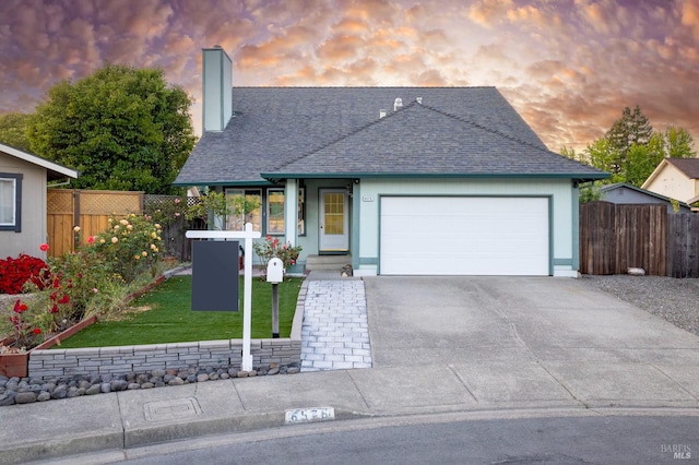 6576 Jade Ct, Rohnert Park, CA 94928 - view of front of property featuring concrete driveway, an attached garage, roof with shingles, and a chimney
