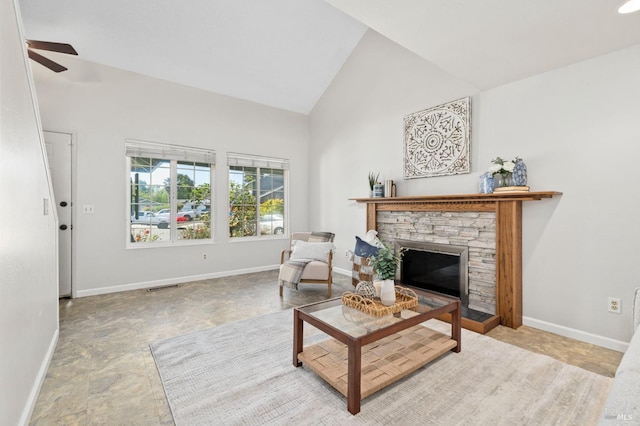 6576 Jade Ct, Rohnert Park, CA 94928 - living area featuring a ceiling fan, baseboards, high vaulted ceiling, and a stone fireplace