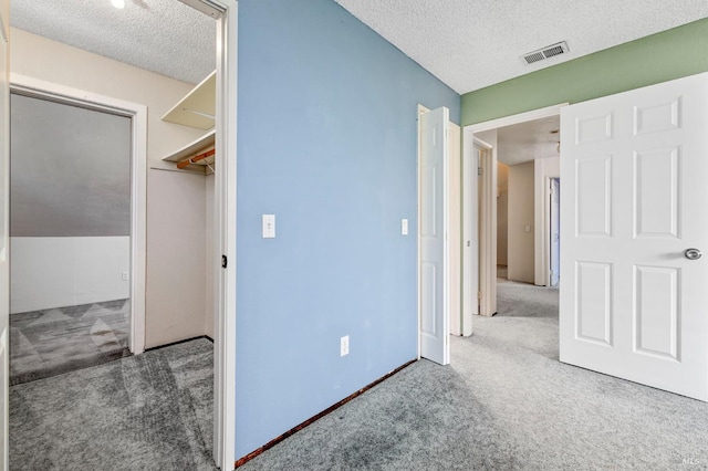 6576 Jade Ct, Rohnert Park, CA 94928 - unfurnished bedroom with carpet flooring, a textured ceiling, and a closet