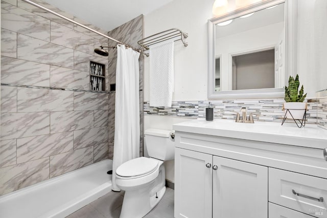 6576 Jade Ct, Rohnert Park, CA 94928 - full bath with toilet, vanity, a tile shower, backsplash, and tile patterned floors