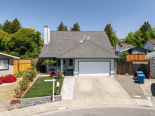 6576 Jade Ct, Rohnert Park, CA 94928 - view of front facade with an attached garage, concrete driveway, roof with shingles, and a chimney