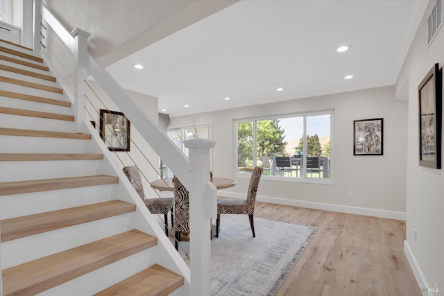 323 Larkin Ct, Benicia, CA 94510 - stairs featuring wood finished floors, recessed lighting, and baseboards