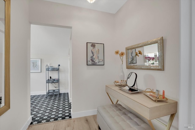 323 Larkin Ct, Benicia, CA 94510 - corridor featuring baseboards, an office area, and wood finished floors