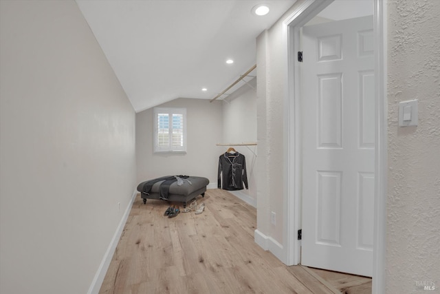 323 Larkin Ct, Benicia, CA 94510 - bonus room featuring light wood finished floors, lofted ceiling, baseboards, recessed lighting, and a textured wall