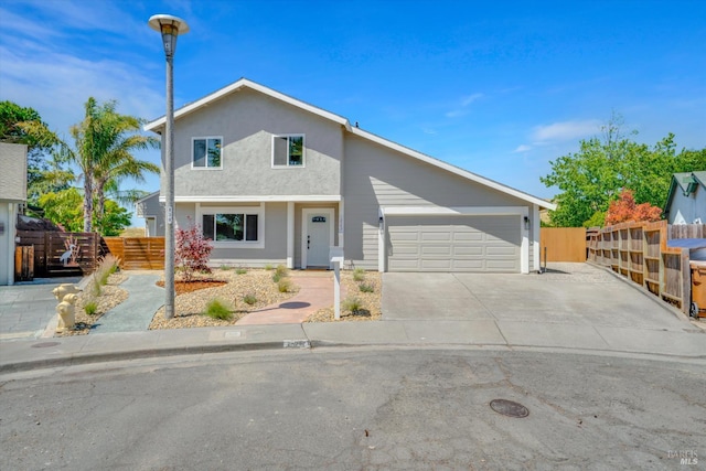 323 Larkin Ct, Benicia, CA 94510 - traditional-style house with an attached garage, driveway, and stucco siding