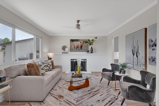 323 Larkin Ct, Benicia, CA 94510 - living room featuring ceiling fan, ornamental molding, a brick fireplace, and wood finished floors