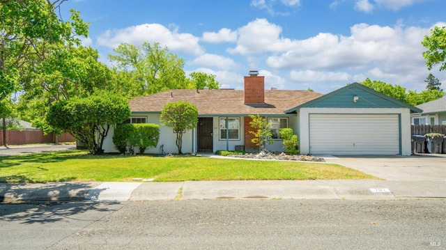 701 Nevada St, Fairfield, CA 94533 - ranch-style house with concrete driveway, a chimney, an attached garage, and stucco siding