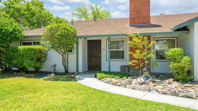 701 Nevada St, Fairfield, CA 94533 - ranch-style house featuring a chimney, a shingled roof, a front yard, and stucco siding