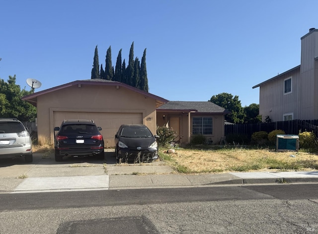 1402 Shasta St, Suisun City, CA 94585 - single story home with a garage, concrete driveway, and stucco siding