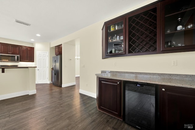 2467 Flatley Cir, Fairfield, CA 94533 - kitchen featuring appliances with stainless steel finishes, beverage cooler, dark wood-style flooring, glass insert cabinets, and baseboards