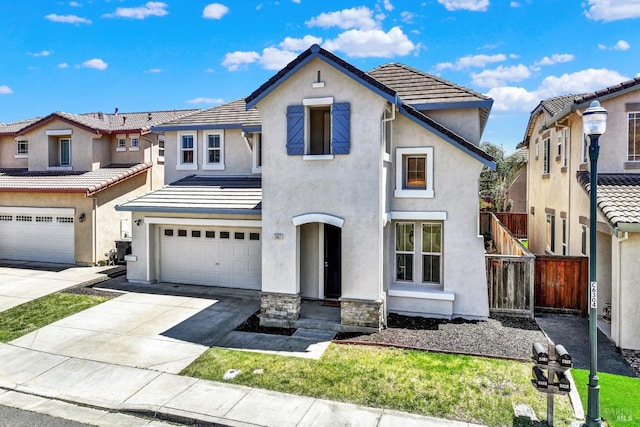 2467 Flatley Cir, Fairfield, CA 94533 - view of front of home featuring stucco siding, driveway, an attached garage, and a tile roof