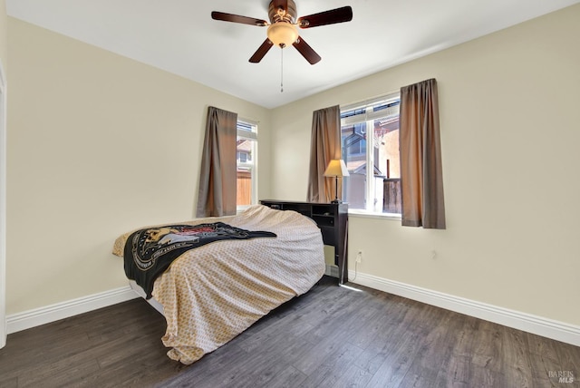 2467 Flatley Cir, Fairfield, CA 94533 - bedroom with baseboards, dark wood finished floors, and ceiling fan