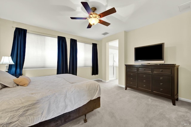 2467 Flatley Cir, Fairfield, CA 94533 - bedroom featuring light colored carpet, baseboards, and a ceiling fan