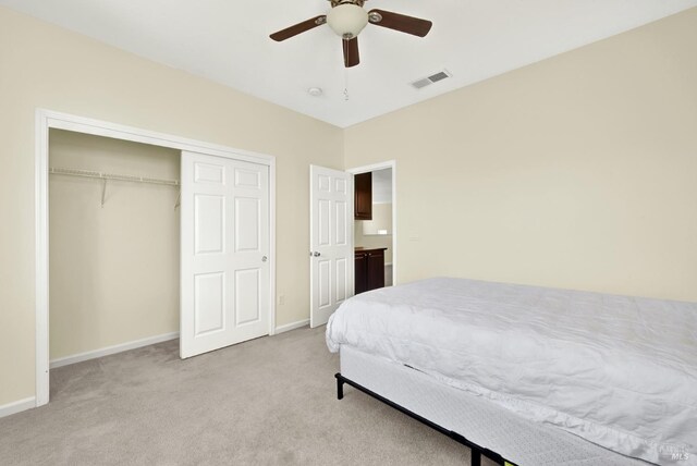 2467 Flatley Cir, Fairfield, CA 94533 - bedroom featuring light colored carpet, baseboards, a closet, and ceiling fan
