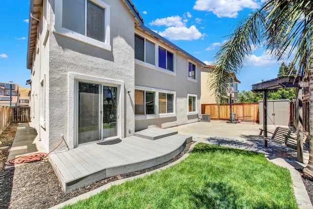 2467 Flatley Cir, Fairfield, CA 94533 - back of house with stucco siding, a patio area, central air condition unit, and a deck