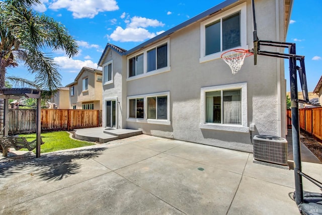 2467 Flatley Cir, Fairfield, CA 94533 - back of house with stucco siding, a fenced backyard, cooling unit, and a patio