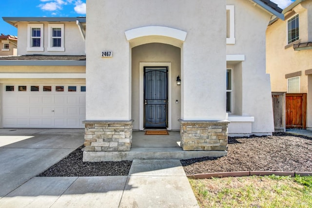 2467 Flatley Cir, Fairfield, CA 94533 - entrance to property with stucco siding, an attached garage, and driveway