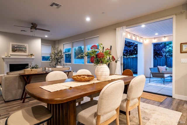 2579 Estery Ln, Santa Rosa, CA 95403 - dining area featuring wood finished floors, ceiling fan, recessed lighting, a fireplace, and baseboards