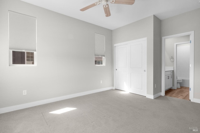 2579 Estery Ln, Santa Rosa, CA 95403 - unfurnished bedroom featuring carpet flooring, a closet, baseboards, and a ceiling fan
