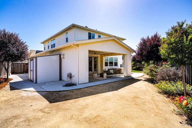 2579 Estery Ln, Santa Rosa, CA 95403 - rear view of house featuring a patio area, a fenced backyard, stucco siding, and a ceiling fan