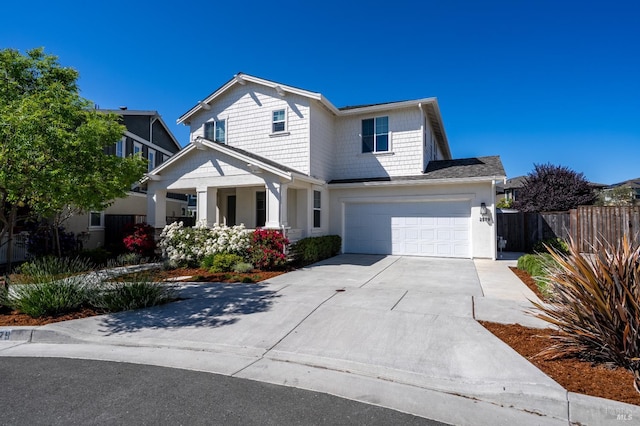 2579 Estery Ln, Santa Rosa, CA 95403 - view of front of house featuring a garage, driveway, a porch, and stucco siding