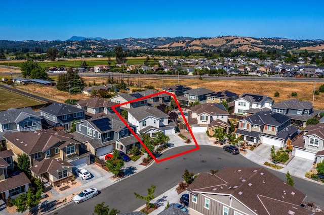 2579 Estery Ln, Santa Rosa, CA 95403 - aerial perspective of suburban area with property parcel outlined and a mountainous background