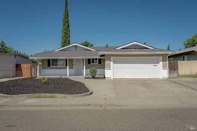 2235 Nottingham Dr, Fairfield, CA 94534 - ranch-style home featuring concrete driveway, an attached garage, covered porch, and roof with shingles